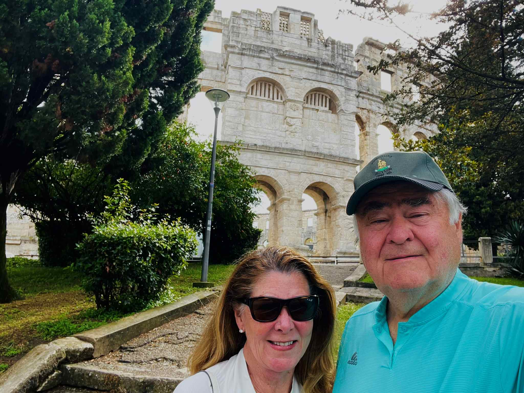 Pula Colliseum in background with Robin and Paul in the front of the picture